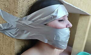 Christian Girl Duct Taped To Pillar Coupled with Gagged Tightly