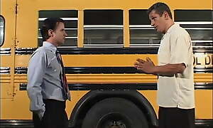 Gilded student in pigtails gets fucked by two dudes in the school bus garage