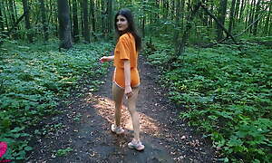 A hungry girl on high a walk in the forest took a guy into the bushes so that he fed her with fresh sperm