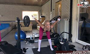 german petite fair-haired sporty fitness teen in pink leggins