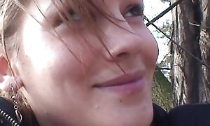 A sweet German teen adequate a age-old cock on every side the woods