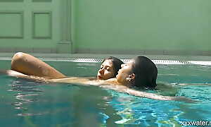 In be imparted to murder indoor pool, two stunning girls swim