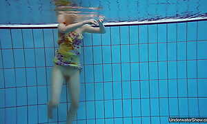 Petite teen Milana Voda endures the unconforming naked swimming