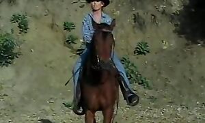 Young beautiful blonde was riding the put on exhibit instantly she has  met handsome cowboy